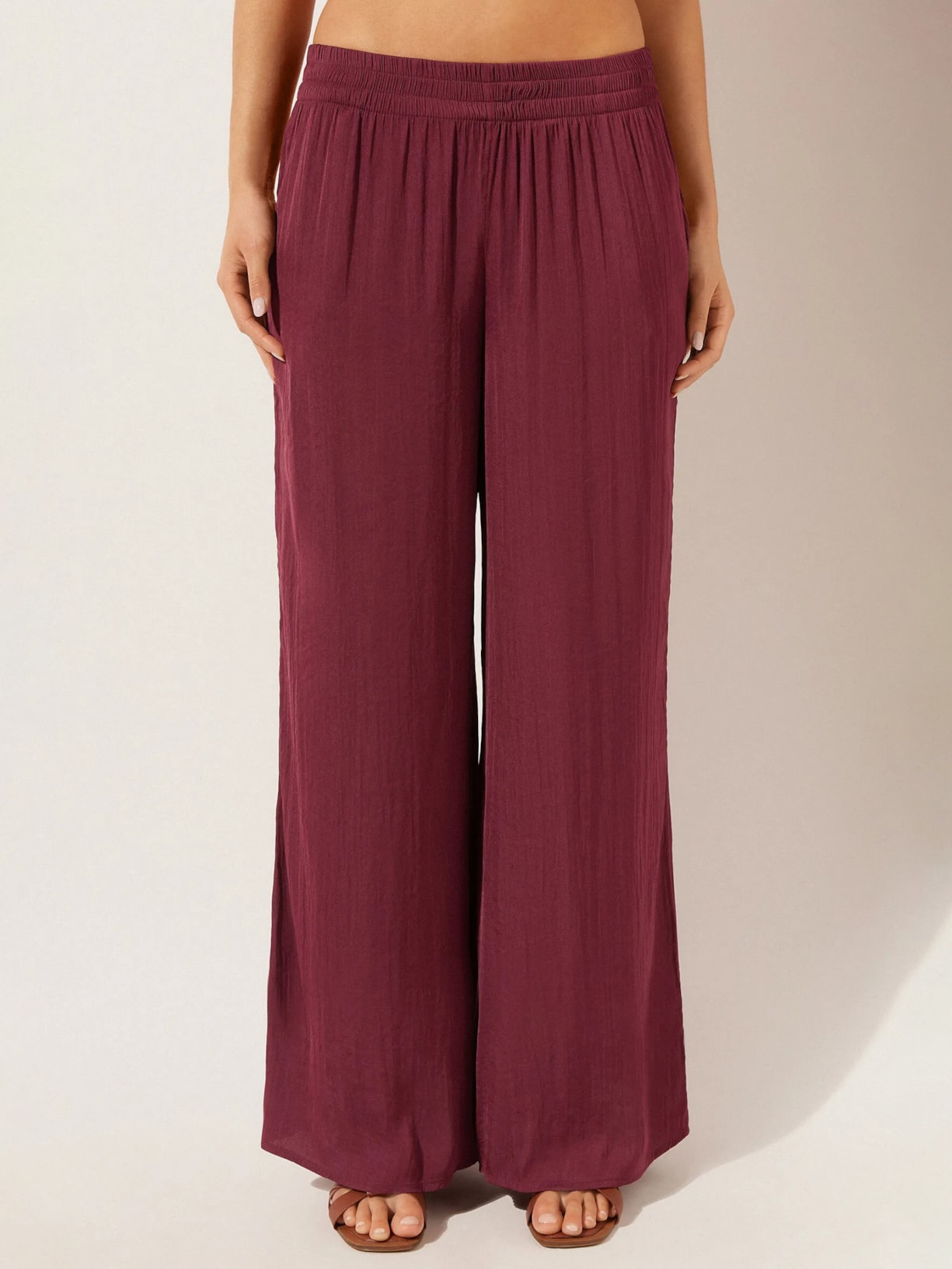 Calça Pantalona Em Tecido Brilhante Bordô Calzedonia