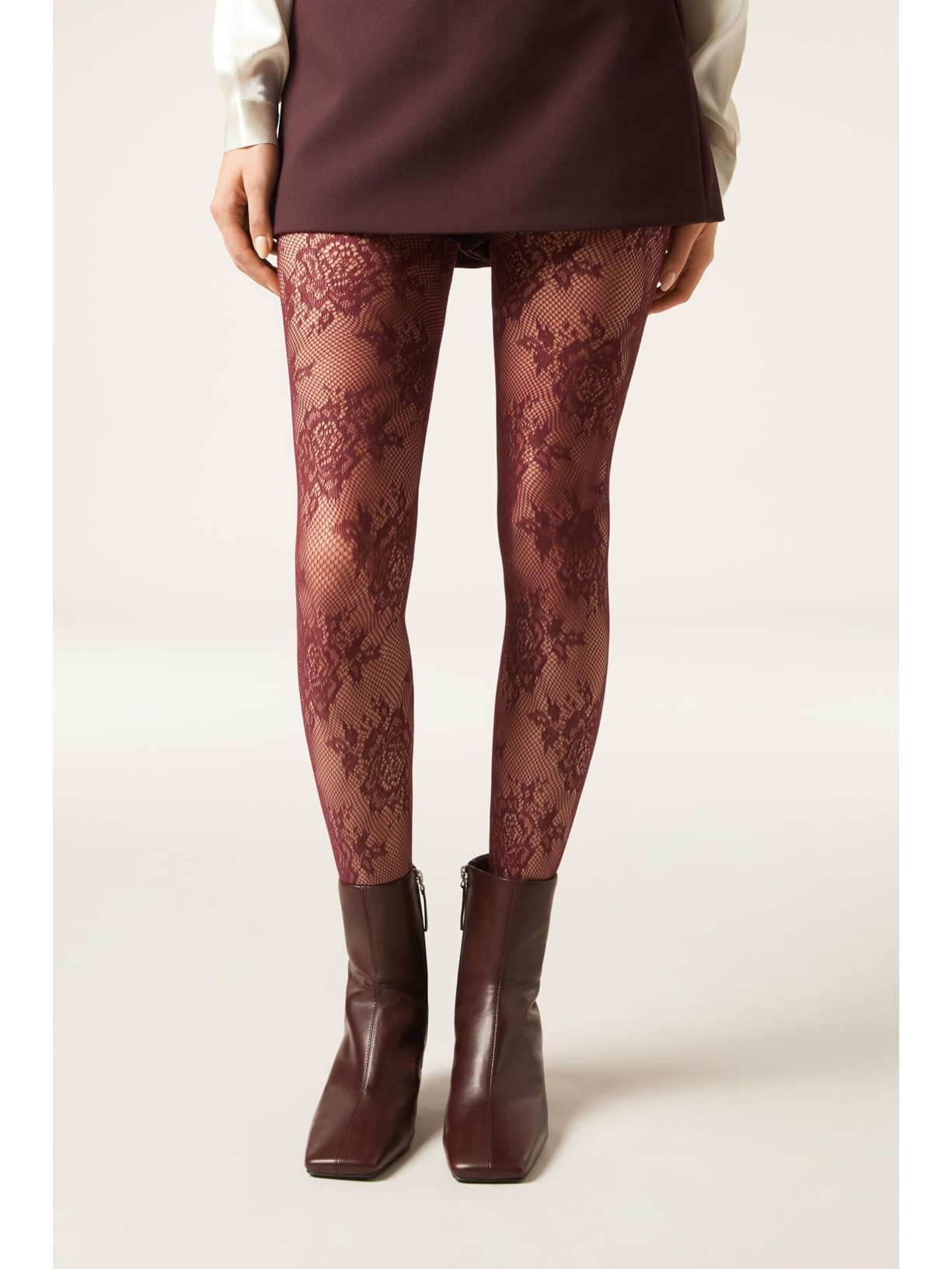 Meia-Calça Arrastão Com Flores Sofisticadas Bordô Calzedonia