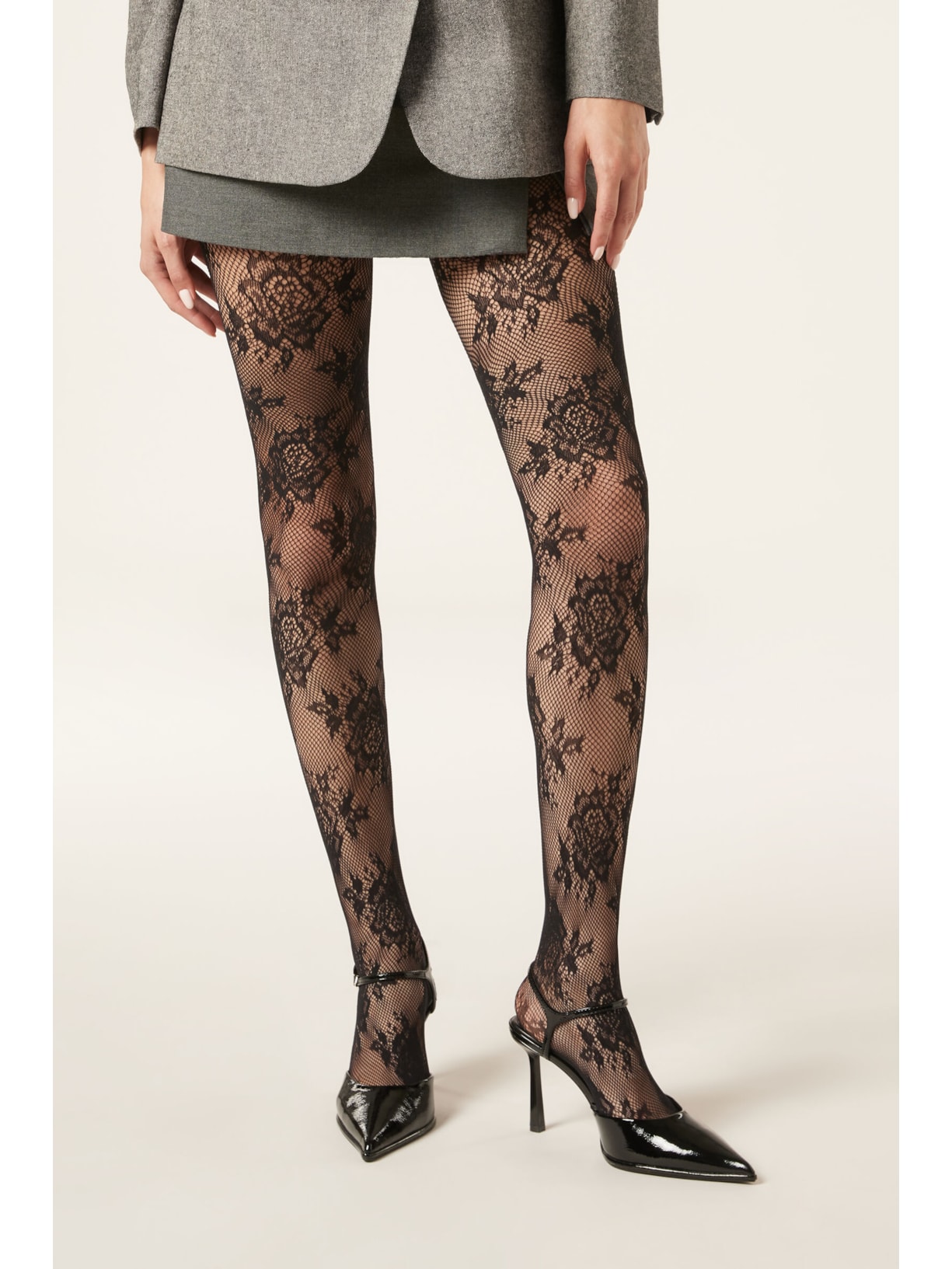 Meia-Calça Arrastão Com Flores Sofisticadas Preto Calzedonia