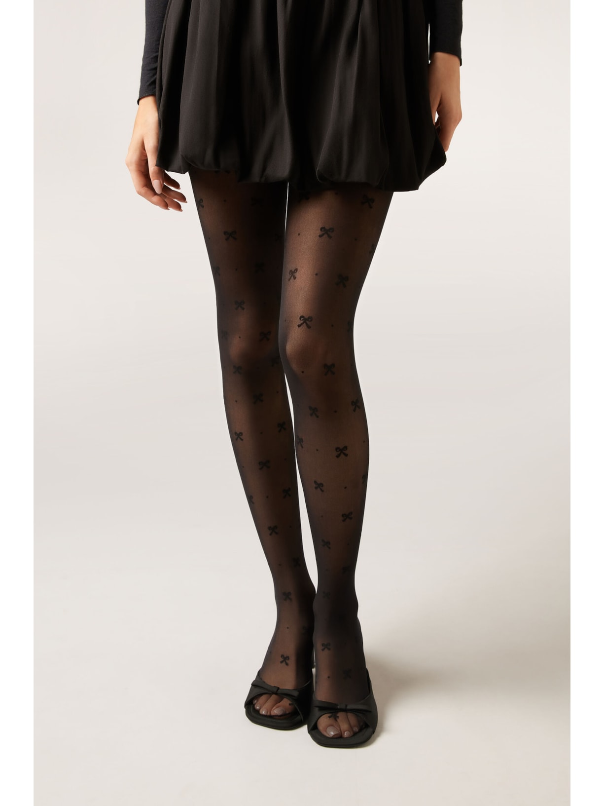 Meia-Calça Transparente Com Laços Em Relevo Fio 30 Preto Calzedonia