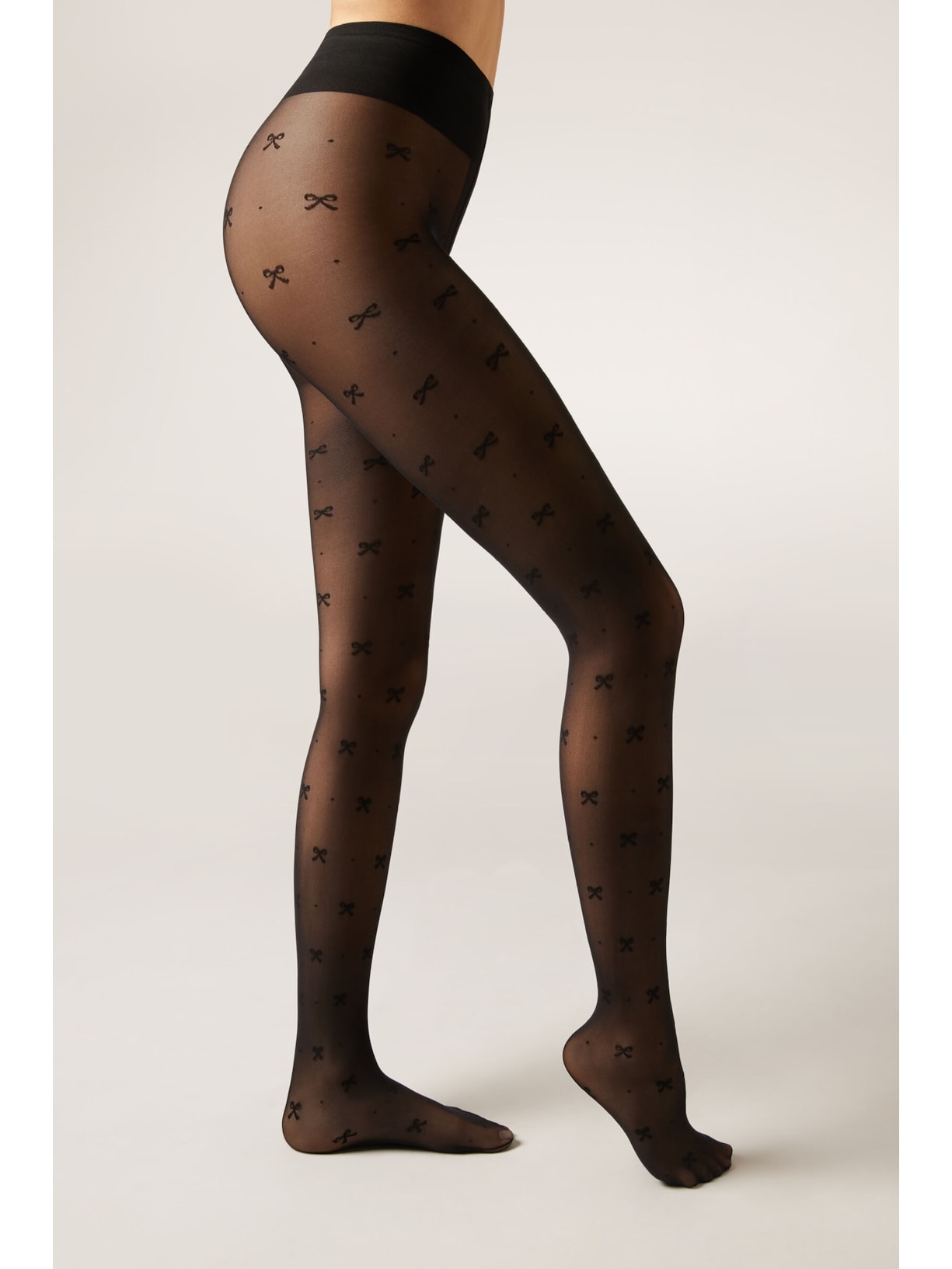 Meia-Calça Transparente Com Laços Em Relevo Fio 30 Preto Calzedonia