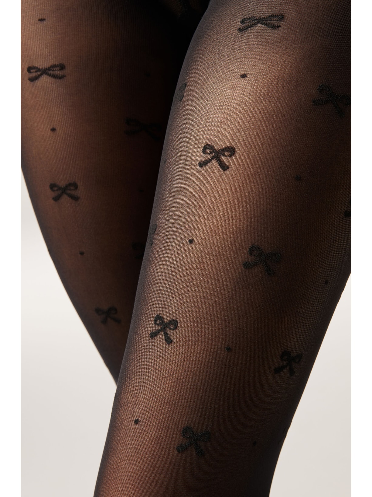 Meia-Calça Transparente Com Laços Em Relevo Fio 30 Preto Calzedonia